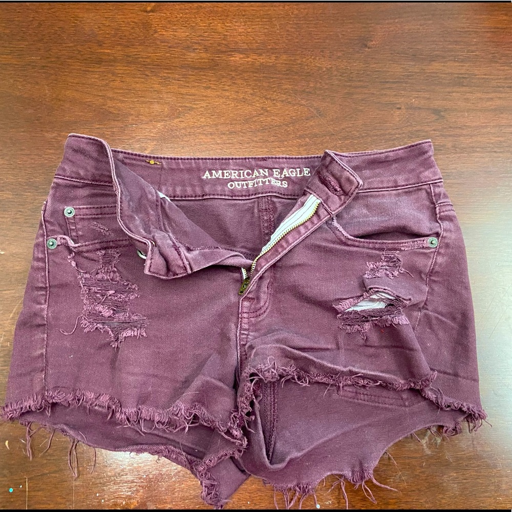 American Eagle distressed burgundy jean shorts